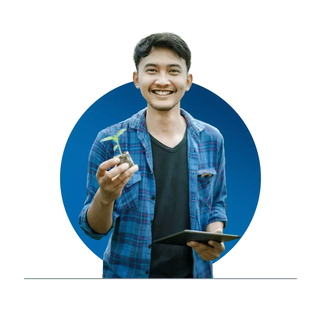 guy with plant and tablet